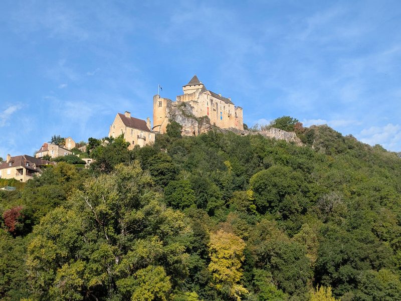 Château de Castelnaud on its wooded hill above the Dordogne valley